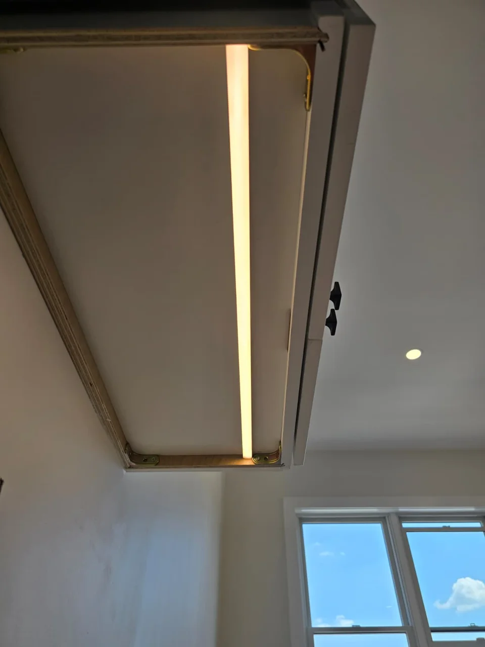 Linear ceiling light at 157 25th Street, Brooklyn